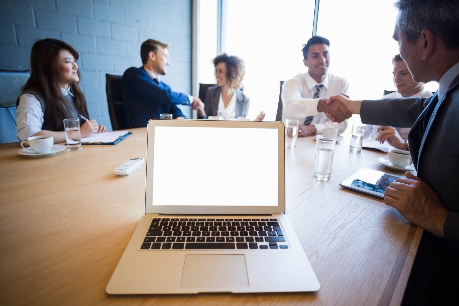 Businesspeople having a discussion in conference room in office